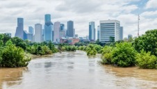 Costs could rapidly rack up without proper climate mitigation and adaptation, the report warns. Pictured: Flooding in Texas following Storm Harvey in 2017
